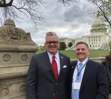 fundraising \ Scleroderma News \ Dressed in suits and ties and smiling broadly, former Scleroderma Foundation CEO Robert Riggs and current Director of Chapter Relations David Murad pose in front of the Capitol in Washington, D.C., during Capitol Hill Day in April 2018. 