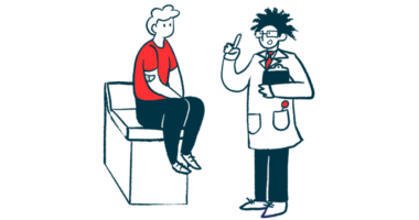 A doctor consults with a patient in an examining room.