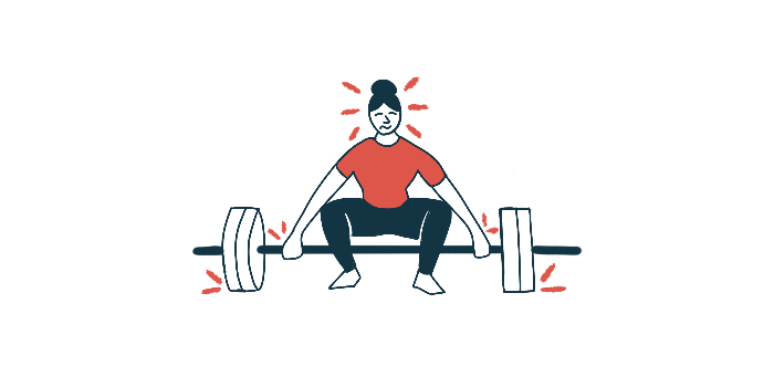 A person squats and grabs a heavy barbell in preparation for weightlifting.
